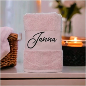 Roze badhanddoeken borduren met naam